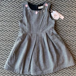 Little girls dress lined with flowers